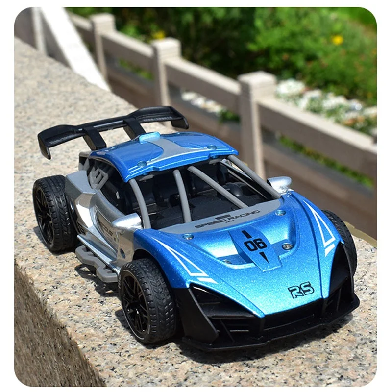 Rechargeable four-way remote control racing alloy remote control car toy model racing boy playmate birthday