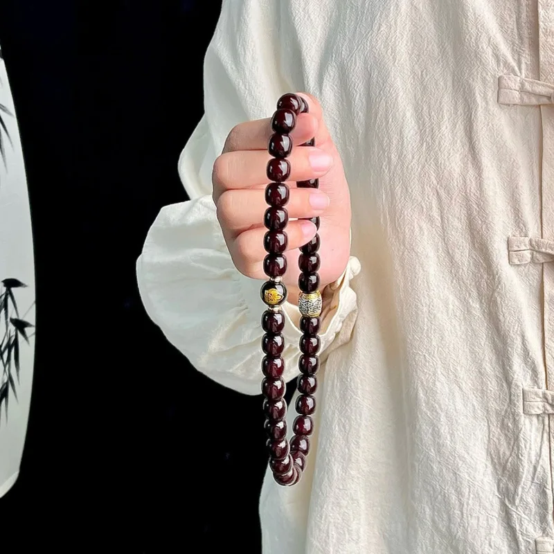 Natural, soft-textured aged Bodhi root beads double-strand zodiac-themed protective bracelet for display and handling handh