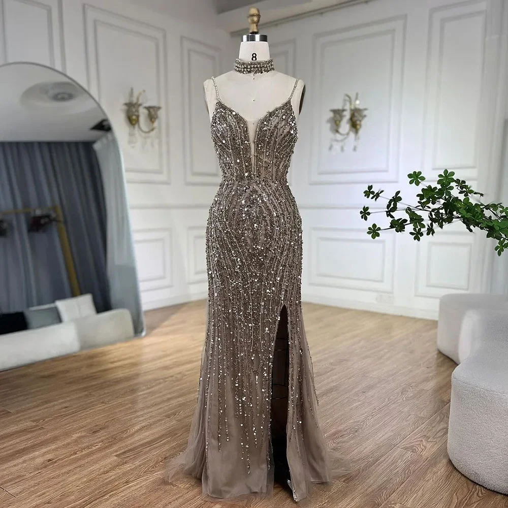 silver prom dress 2025 When luxury meets unforgettable Our stunning client shines brighter than the stars in her custom silver bling prom dress. The 2025 season is here, and I'm ready to design YOUR
