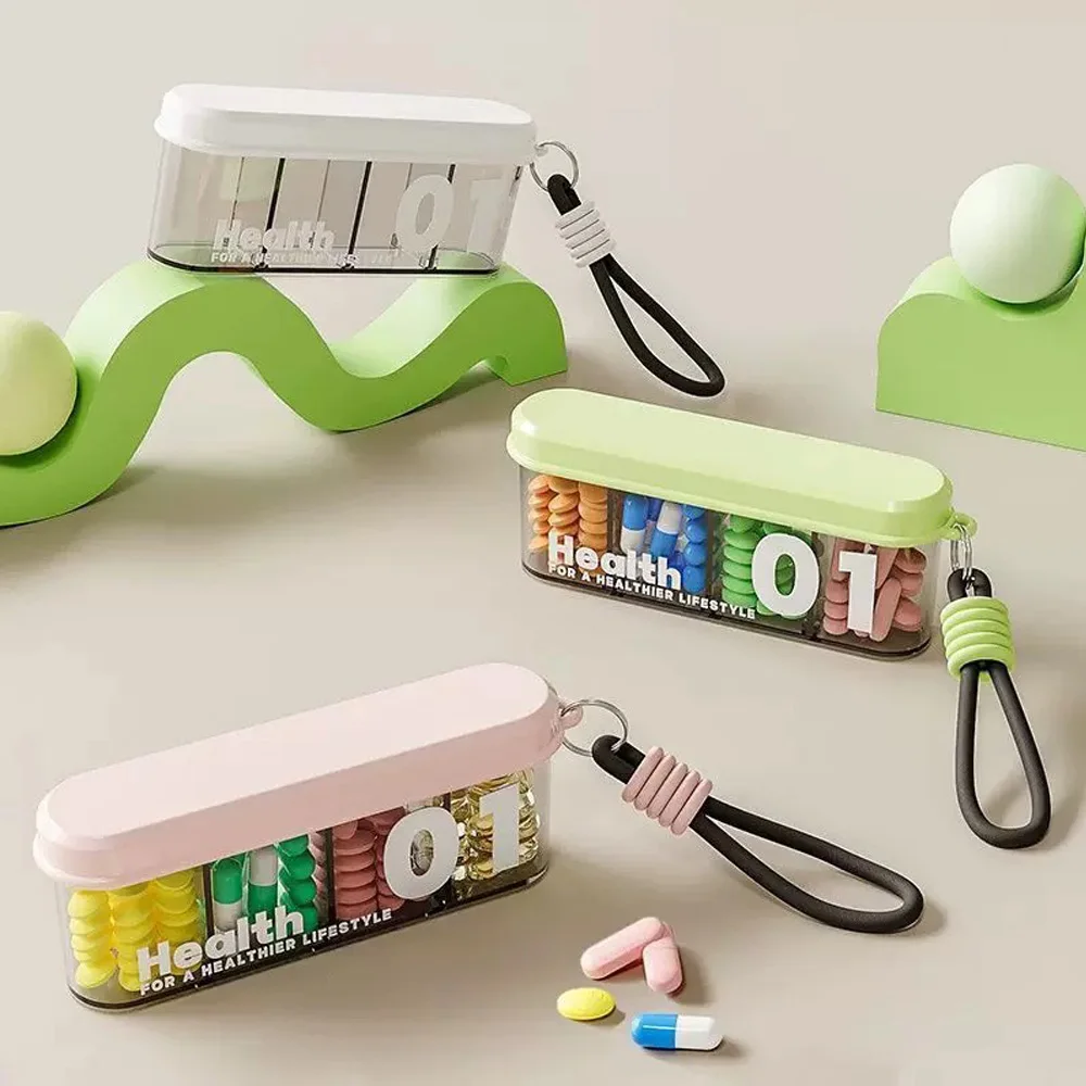 1PC creative medicine box, convenient portable medicine packaging box, seven day mini pill storage box, hanging rope