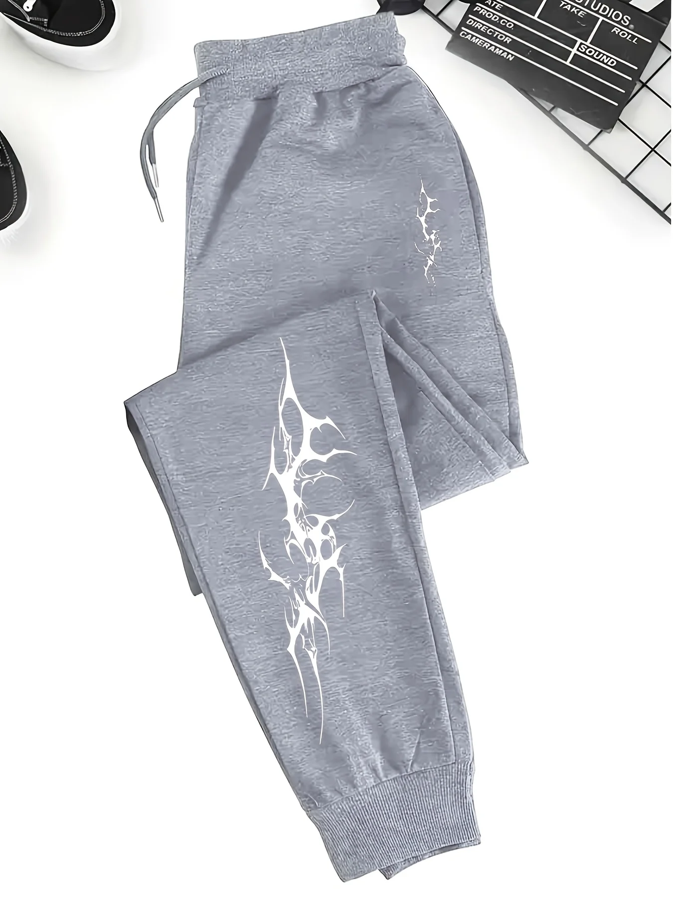 Dark‑styled spiky line graphic artwork print relaxed loose sweatpants men hip hop sports casual jogger pants modern cut