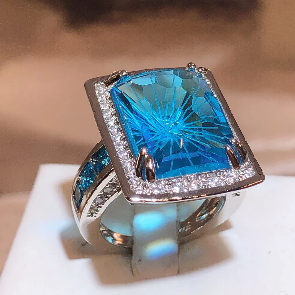 Anillo de compromiso con Topacio Azul océano para mujer, sortija de pareja de diamantes completos de zafiro rectangular exagerado, joyería nupcial chapada en plata