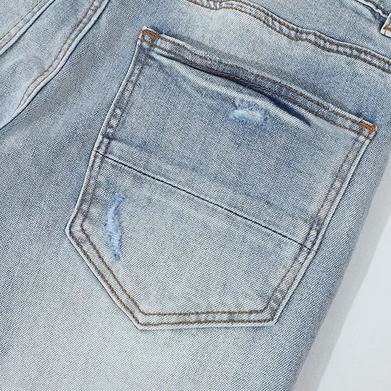 Y2K جينز عصري جديد عالي الجودة قابل للتمدد بقصة ضيقة مغسول بالحنين مثقوب باللون الأحمر سروال رجالي أزرق فاتح هومب