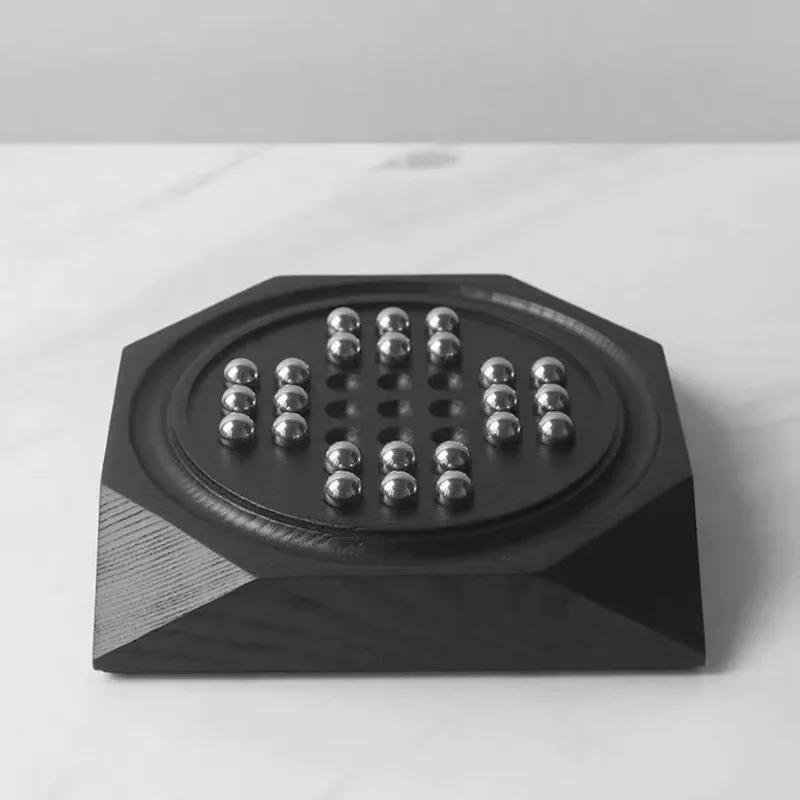 Modern light luxury creative solid wood puzzle Kong Mingqi checkers game ornament model room study children's room decoration