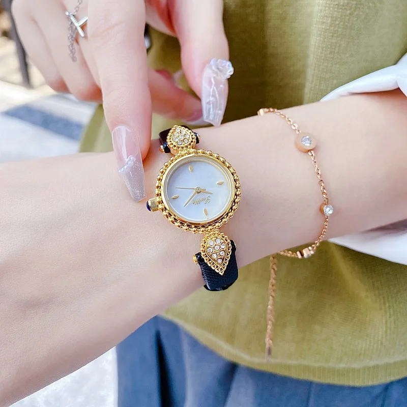 UTHAI-Reloj de pulsera de cuarzo con correa de cuero para mujer, relojes de diamantes con cara de concha, marca de lujo ligera, resistente al agua