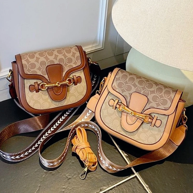 

Новая ниша 2025 года, модная и универсальная полукруглая седельная сумка с ощущением высококачественной сумки через плечо на одно плечо.