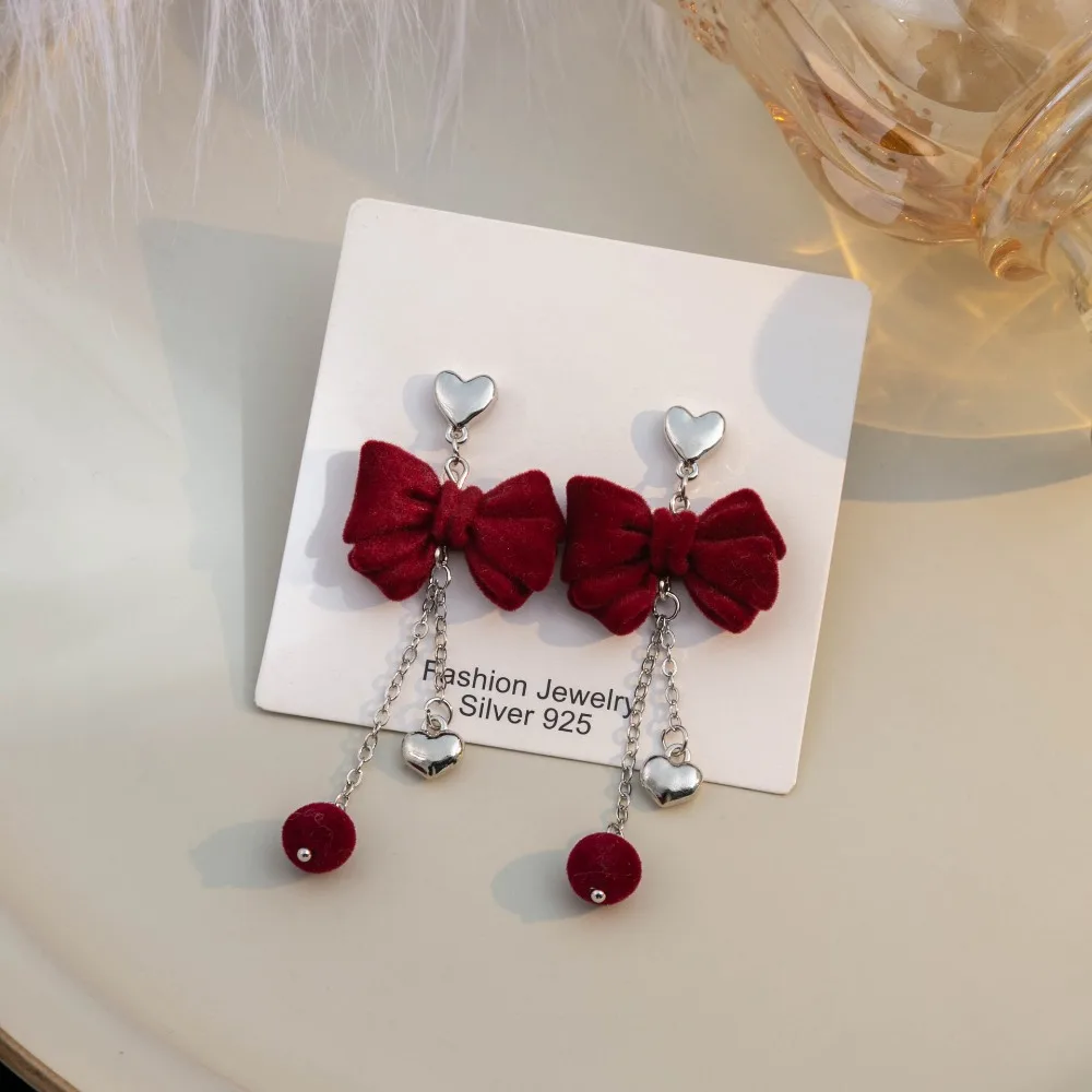 Orecchini pendenti con fiocco Bowknot Accessori per gioielli Cuore d'amore Bowknot Ciondolo orecchio Lega floccaggio Orecchini pendenti con fiocco Regalo di Capodanno