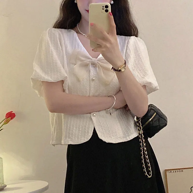 Korean Sweet V-Neck Bow Shirt Women\'s Clothing Elegant Single-breasted Summer Solid Color Casual Basic Short Sleeve Loose Blouse