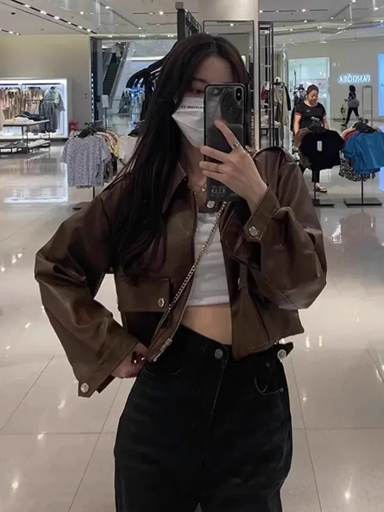 Primavera curto marrom casual jaquetas de couro falso para mulheres ombro caído manga comprida bolsos zíper legal corp topo