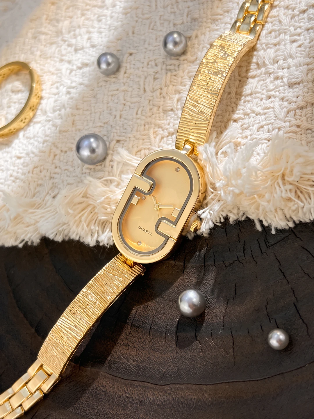 Stylish Graceful Premium Oval Double F Motif Dial Jacquard Gold Curved Band Elegant Watch for Woman