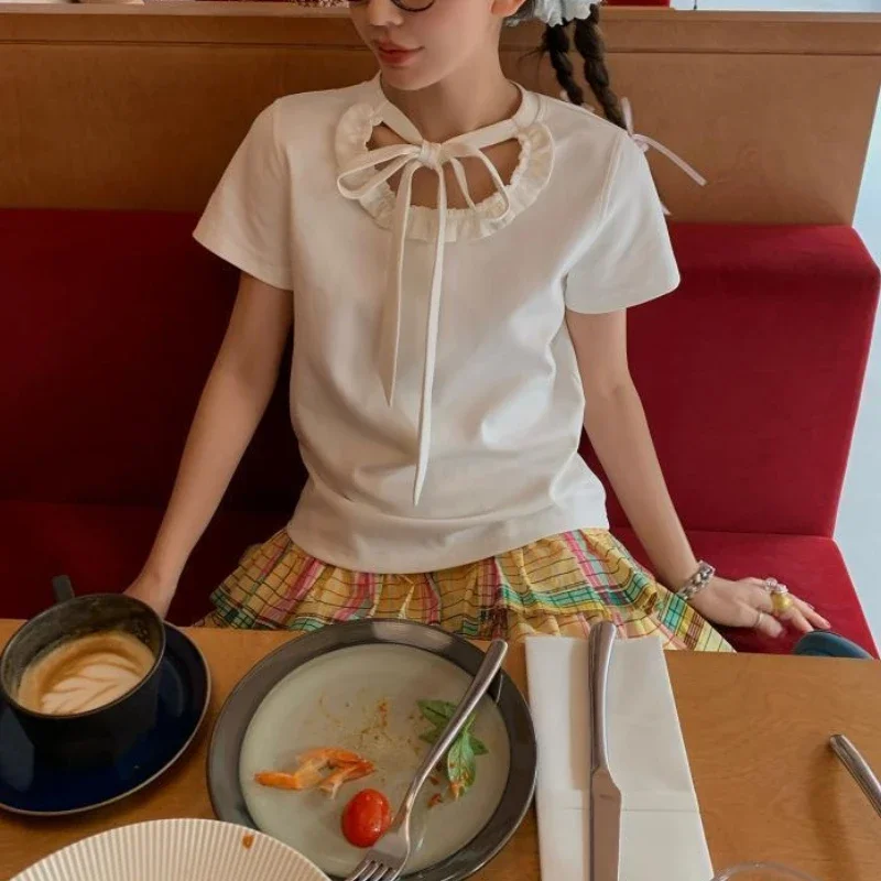 

2025 New Summer Korean Version Sweet Minimalist Cute Short Sleeved Ruffles Round Neck Solid Color Lace Up Women's T-shirt Top