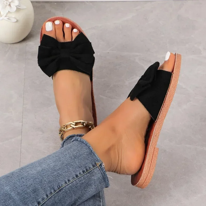 Neue Schuhe für Frauen Mode Damen Hausschuhe Butter knoten Schuhe Frauen flache Rutschen Damen lässig Strand Flip-Flops Frauen