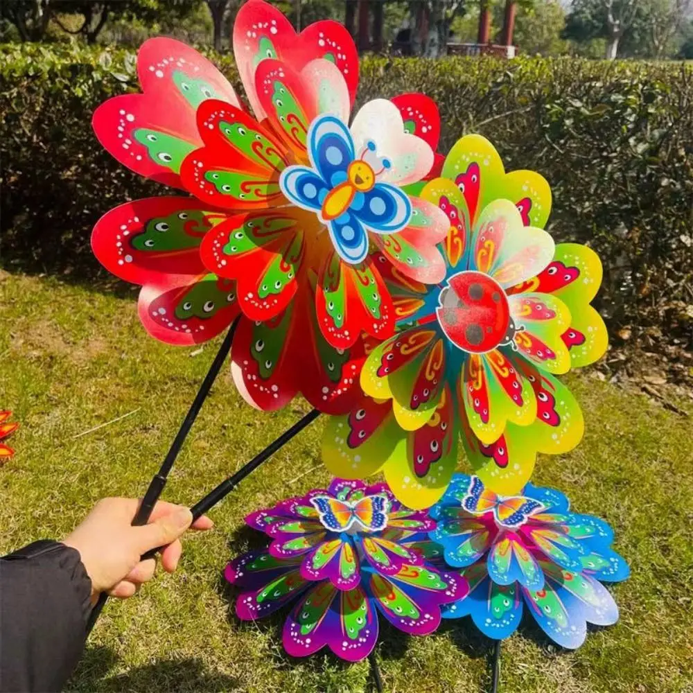 Molino de viento de mariposa de baile de plástico multiestilos, molino de viento de mano de dibujos animados de mariposa 3D colorido, diámetro de 24cm de PVC