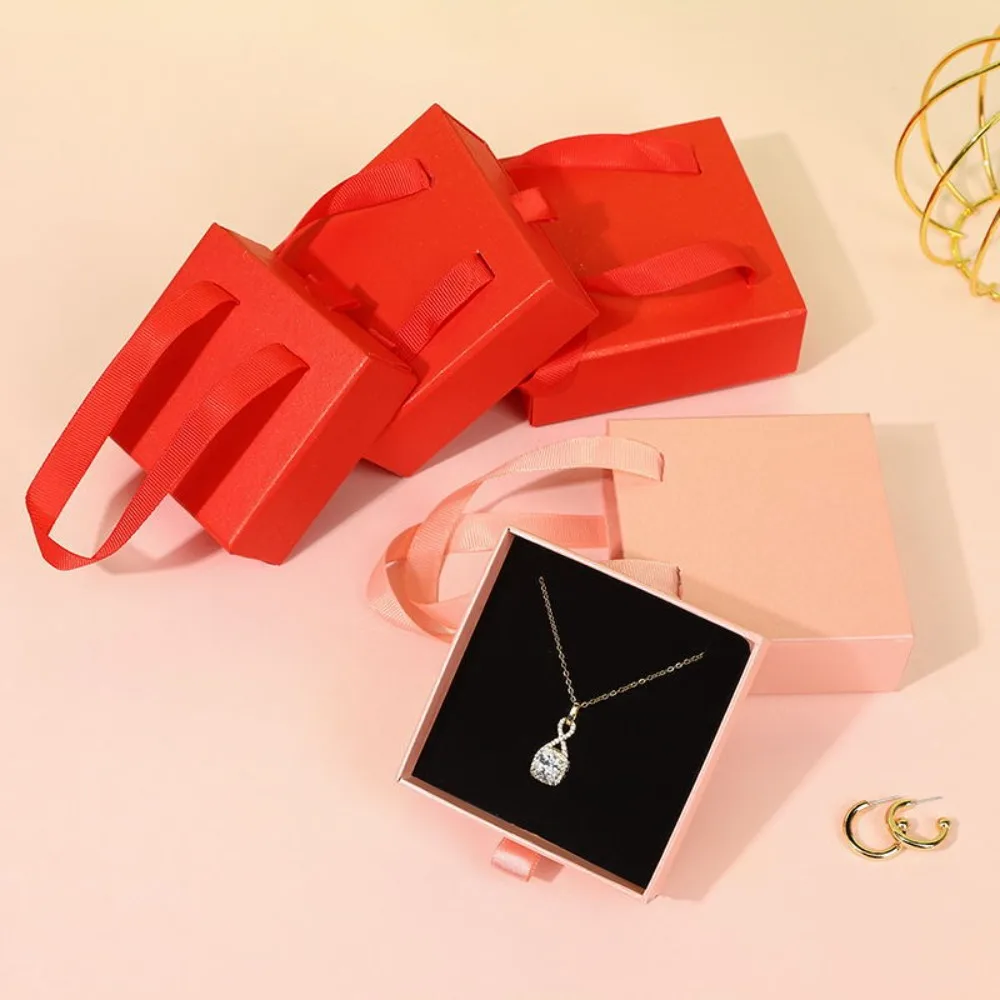 

Portable Cardboard Drawer Jewelry Package Box Ribbon Handle With Handle Gift Box Solid Color Sliding Necklaces Box Bracelet