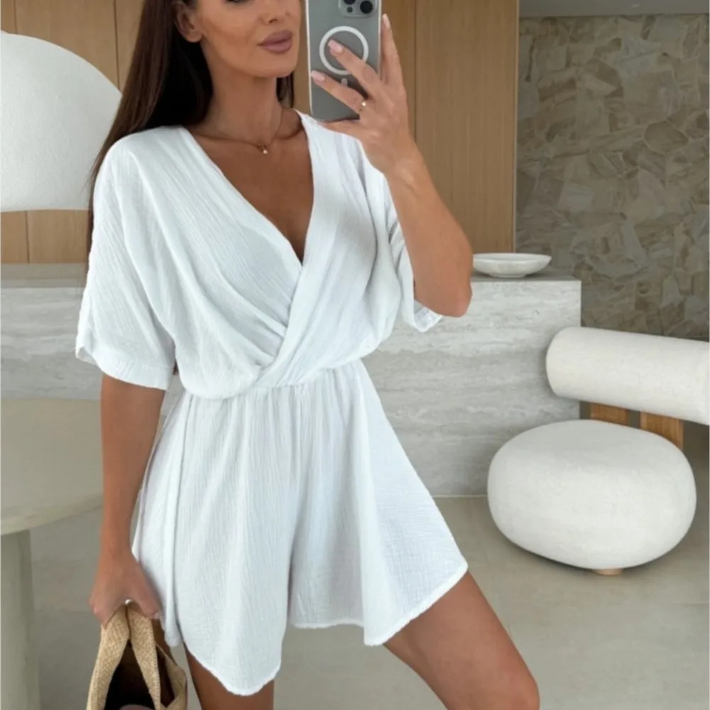 

Deep V-neck Pleated Short Jumpsuit Sexy Summer Fashion Waist Solid Color Five Quarter Sleeve Loose Women's Jumpsuit