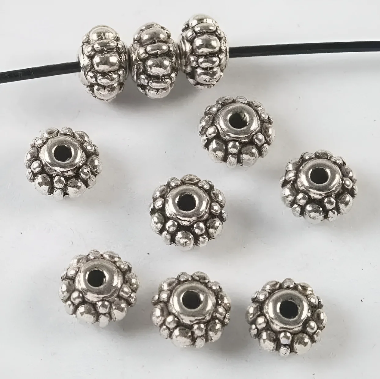 35pcs  7x4.6mm hole:1mm   dark silver  flower spacer beads   HWH3837