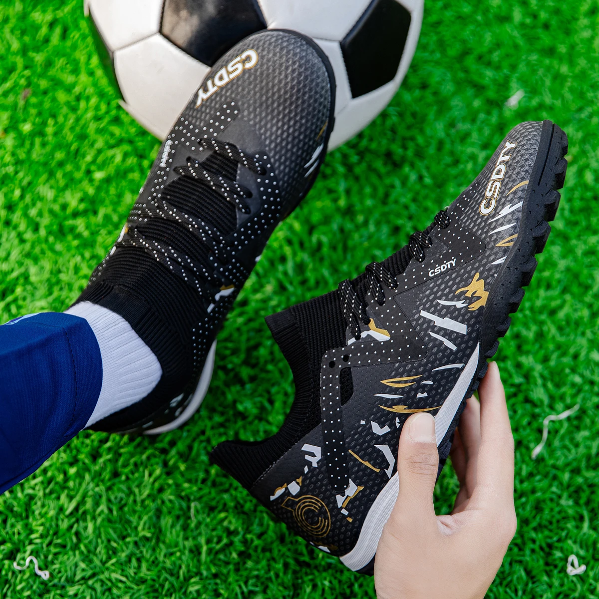 Męskie buty piłkarskie TF/AG Turf treningowe Futsal do piłki nożnej buty outdoorowe dla dzieci trampki wysokiej jakości Assassin Chuteira Campo