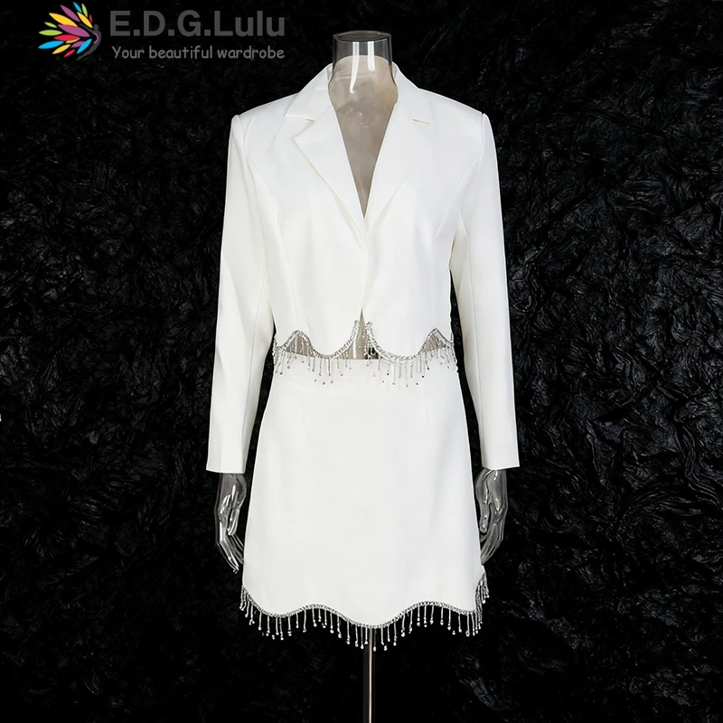 

EDGLuLu комплект со стразами и кисточками, короткий пиджак с отложным воротником + мини-юбка, черный, белый цвет, женский комплект из двух предметов 1117