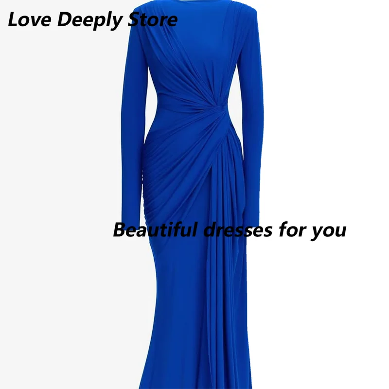 فستان سهرة رسمي مخصص بأكمام طويلة حورية البحر ورقبة دائرية باللون الأحمر من الجيرسيه بطول الأرض وطيات وسحاب خلفي للمشاهير