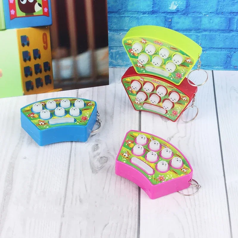 Nieuw leuk Mini Gopher Palm hands-on snelheidsspel voor kinderen met lichte muziekpuzzel Kindervakantiespeelgoedcadeau