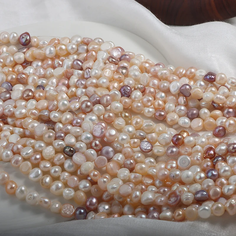 7-8mm candy-colored, seedless side-drilled mixed-color two-sided glossy pearl strand, approximately 35cm long with 48 beads.