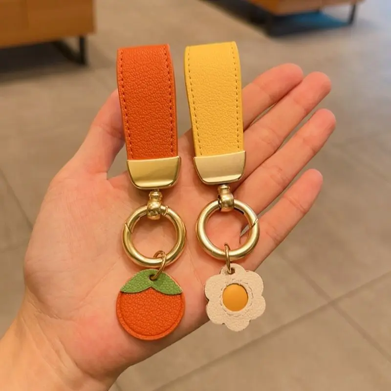 The New Pendant of The Keychain  Has  Same Simple Leather Rope Keychain, and  Cute High-end Pendant Chain for Women.