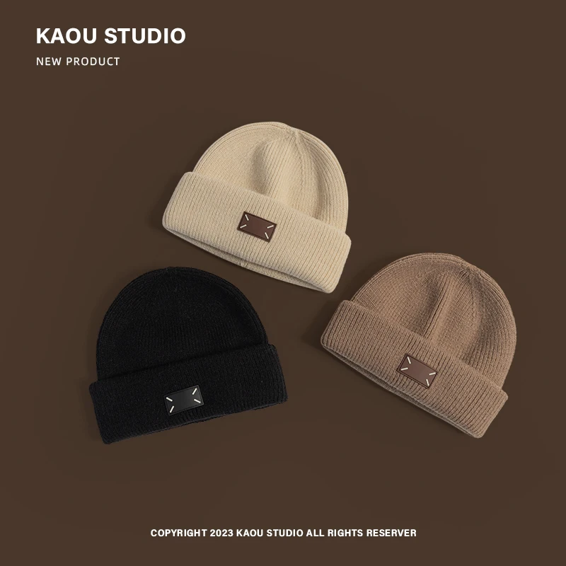 2023 New Autumn and Winter Woolen Hat Women's Simple All-Matching Leather Tag Knitted Hat Men's Outdoor Skiing Beanie Hat Tide