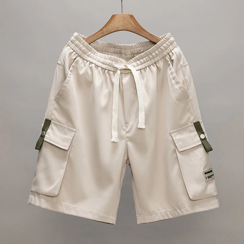 กางเกงขาสั้นทำงานทรงหลวมไซส์ใหญ่พิเศษ 8XL สำหรับผู้ชาย สไตล์เทคแวร์ กางเกงคาร์โก้ กางเกงกอล์ฟผู้ชาย มีกระเป๋าหลายช่อง กางเกงยุทธวิธี กางเกงขาสั้นลำลองฤดูร้อนสำหรับผู้ชาย