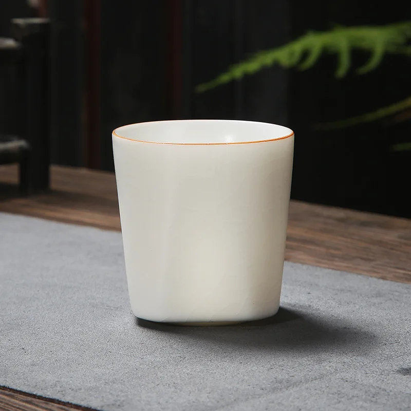 La porcelaine Ru de thé au four de Jade blanc peut être infirminée avec une tasse de dégustation d'œuf de Dragon craquelé en céramique de grande capacité