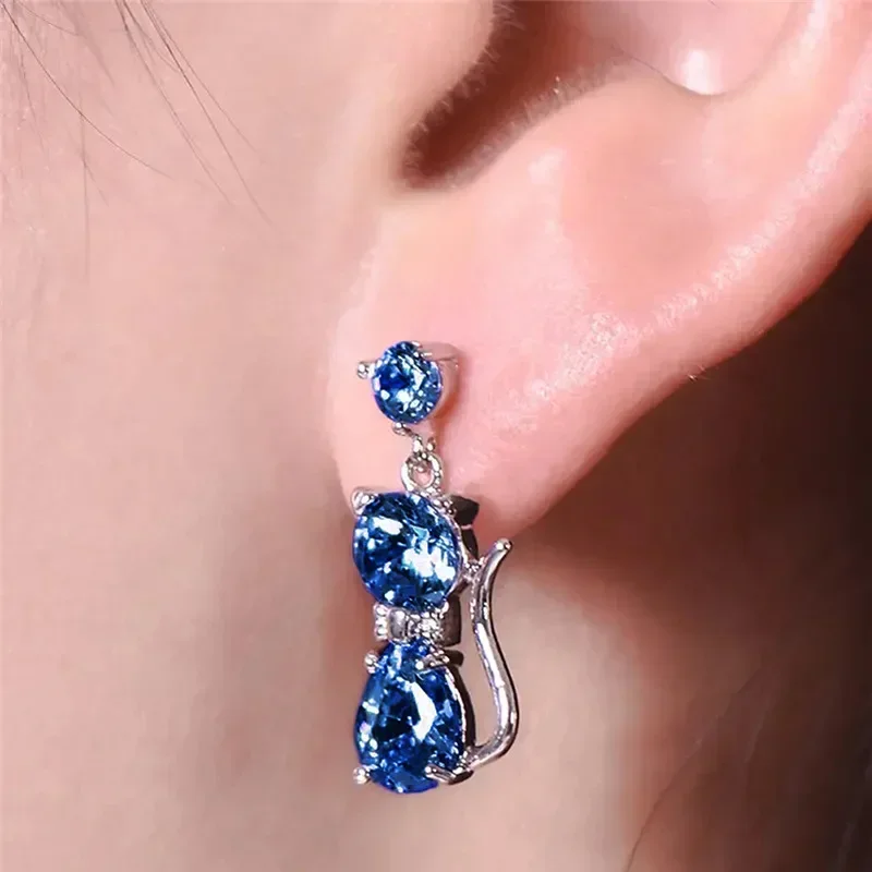 2025 أقراط أوروبية وأمريكية راقية على شكل قطة، إكسسوارات قطط أنيقة ومتعددة الاستخدامات