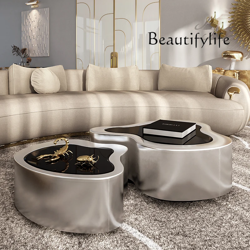 Light luxury high-end coffee table stainless steel special-shaped concave-convex irregular glass combination coffee table