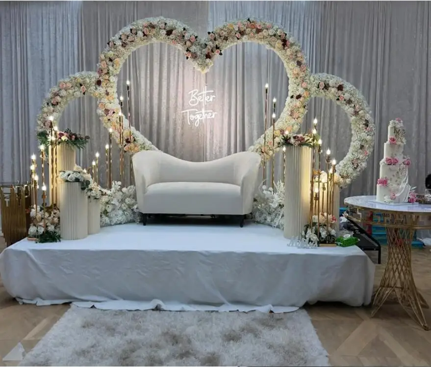 

Giant triple heart-shaped metal wedding arch background