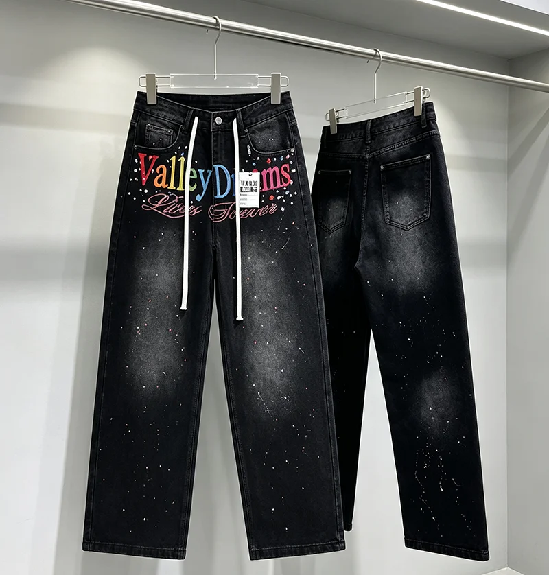 VALLEY Men Women Casual Blue Denim Jeans Front Multi Color Letter Graphic Paint Splatter Detail Wide Leg