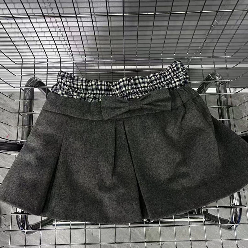 KBQ أنيقة أنيقة تقسم Bowknots ألف خط التنانير للنساء عالية الخصر مزاجه طيات التنانير الصغيرة الإناث موضة الخريف نمط