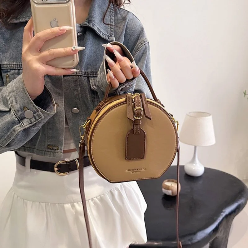 حقيبة يد نسائية مصنوعة من الجلد الفاخر تتميز بنمط كاجوال بسيط عتيق وباريس ​