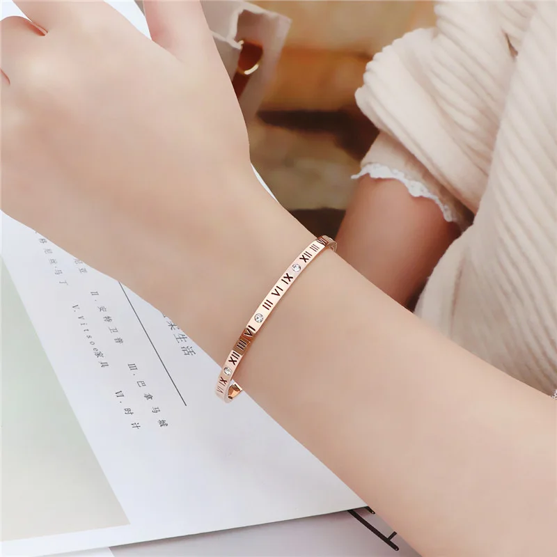 316L titanium steel electroplated hollow Roman numeral bracelet with 360 degree fine polishing and grinding