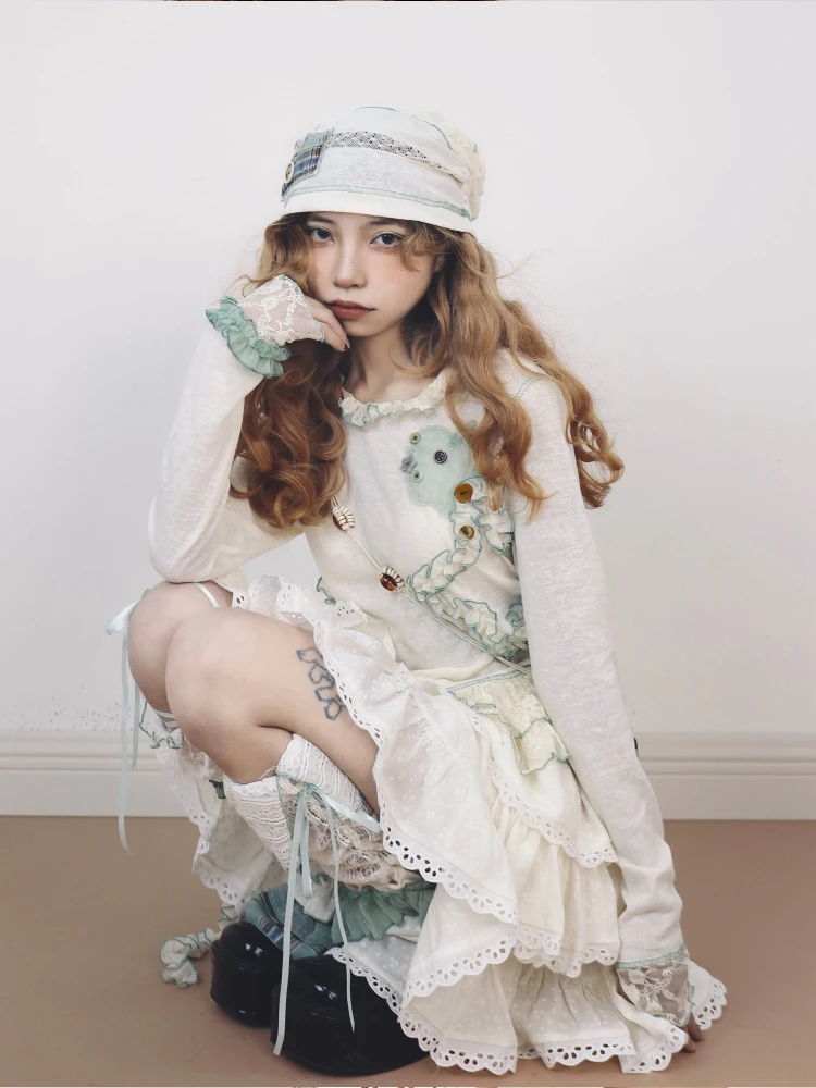 Original novo outono irregular renda emenda cor contrastante manga comprida de malha camiseta topo branco bolo saia empilhamento meias