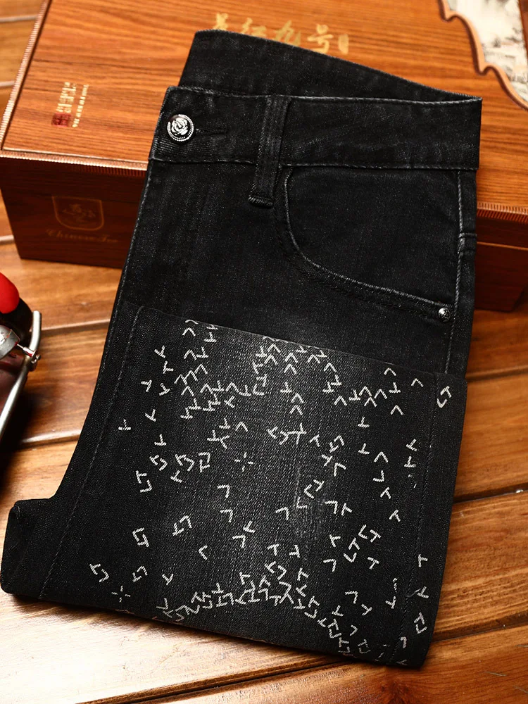 

Light luxury fashion black jeans for men's autumn and winter personalized printed elastic slim fit small feet trendy denim pants