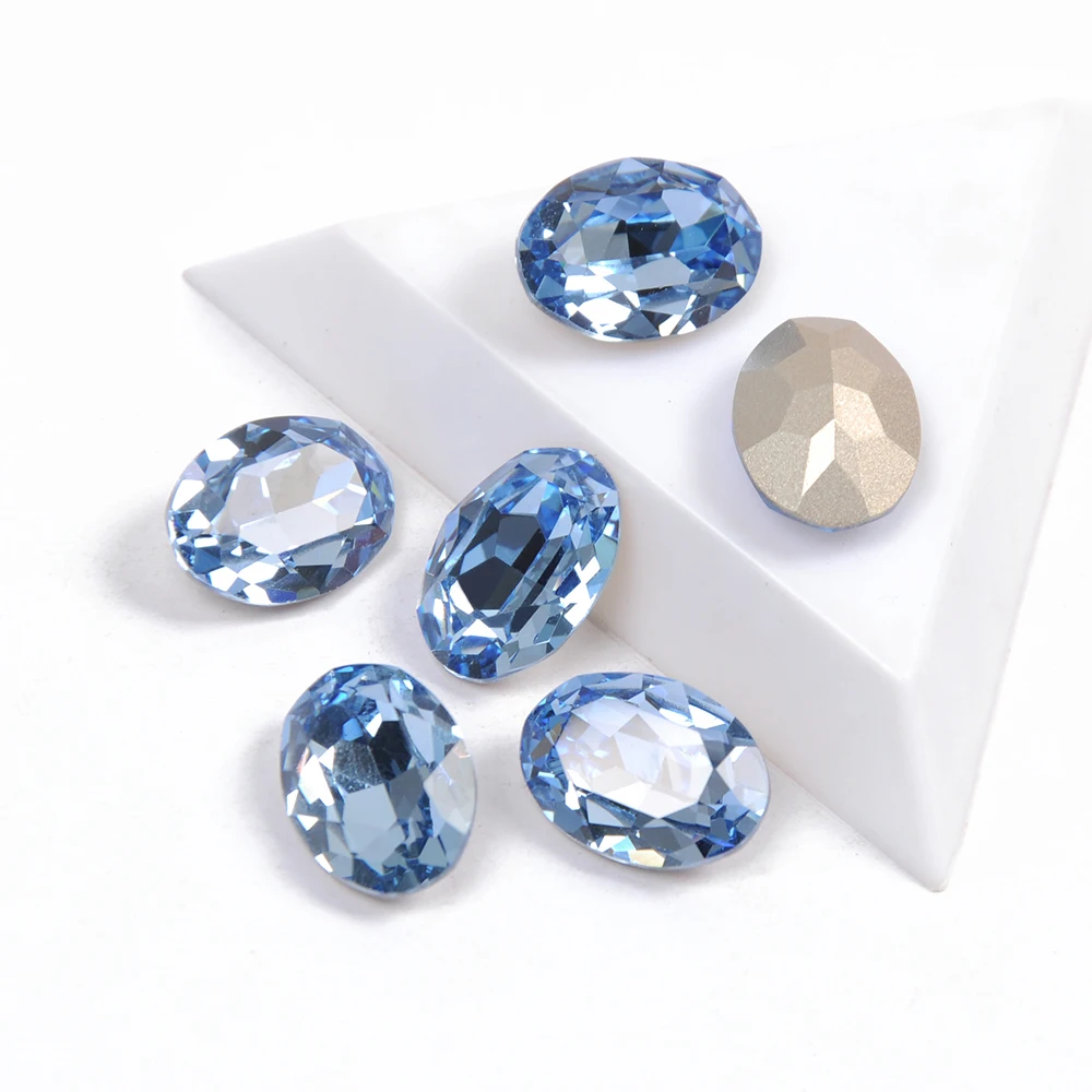 

Light Sapphire Oval Shape K9 Nail Charms Fancy Crystal Multi-sizes Pointback Rhinestones for 3D Nail Art Accessories