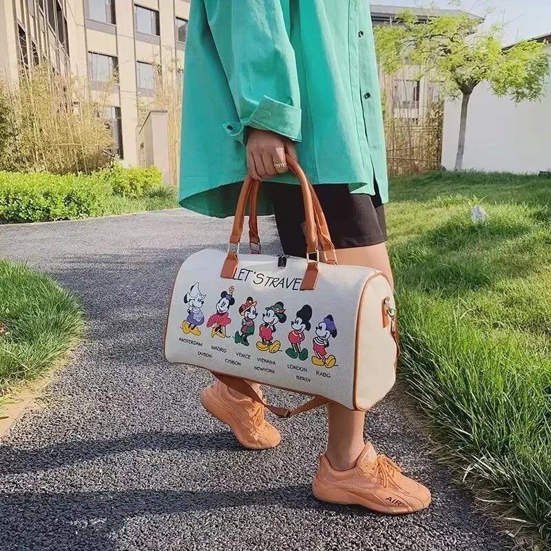 Bolsa de viaje de marca de lujo de Disney, equipaje de dibujos animados de Mickey, bolso de lona, bolso de mamá, bolso de gran capacidad, bolsa de almacenamiento para mujer, Maleta