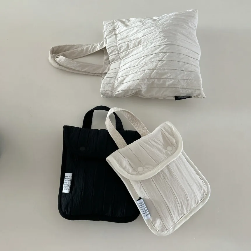 シンプルな単色リップスティックメイクアップバッグ、ポータブル収納バッグ保護カバー、ダブルボタンデュアルカラーハンドヘルド収納小型バッグ