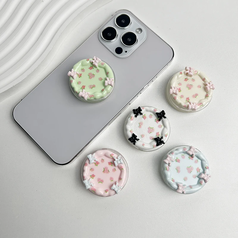 Soporte de Escritorio Retráctil y Plegable Transparente para Teléfono con Agarre para iPhone 17, Tipo Bandeja Pequeña Creme Cola