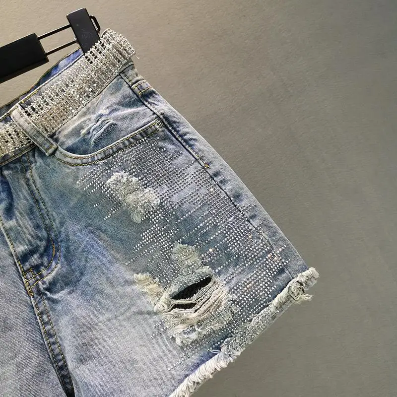 Neue Sommer Frau Denim Shorts weibliche Diamant Perlen Quasten glänzend schick kurze Empire zerrissene Löcher schlanke Shorts Damen Hose q887