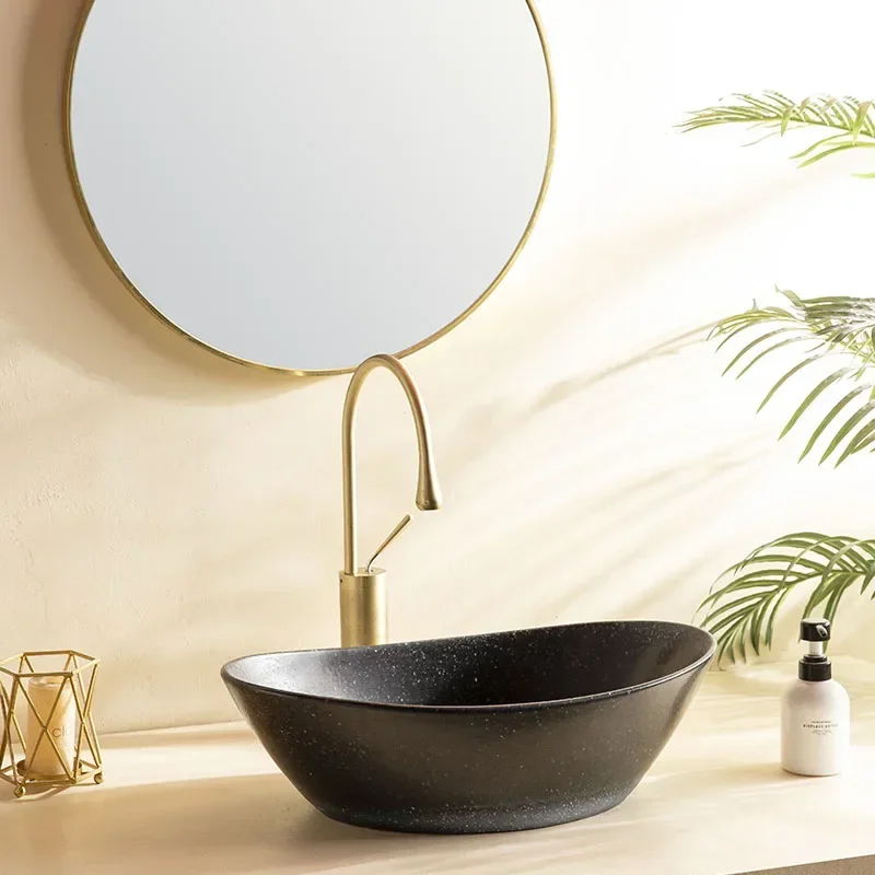 

Black ceramic tub bathroom sink, on-stage wash basin, domestic balcony bathroom hotel decoration courtyard wash basin sink