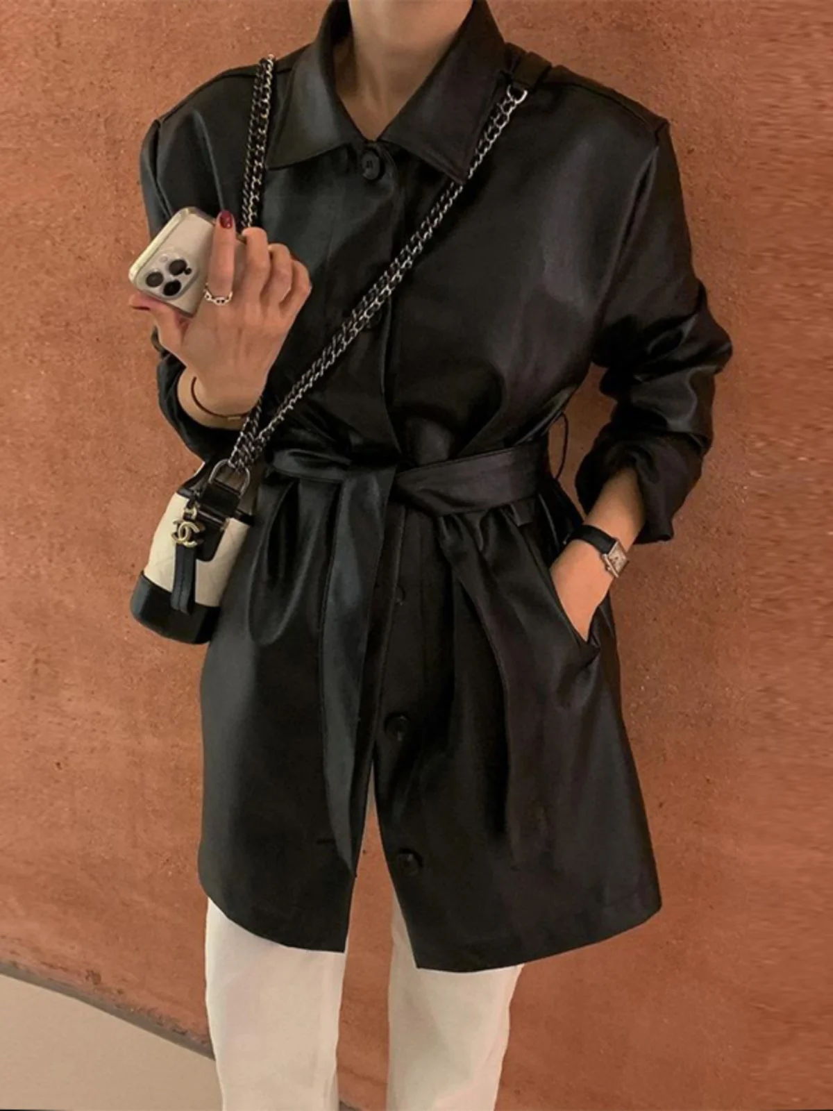 Bla Leather Jaet المرأة ربيع 2025 جديد منتصف طول التخسيس طويل Sve تصميم سترة واقية بولي Leather الجلود تخفيف Sle