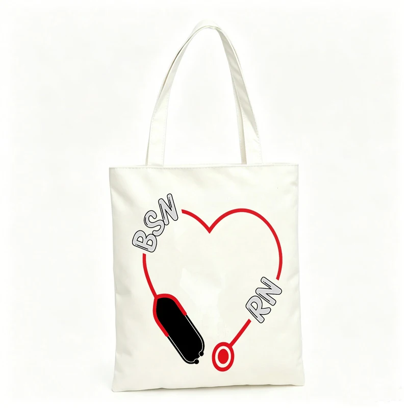 Nurses' canvas tote bag with heart and stethoscope graphic, ideal for daily work and medical professional use