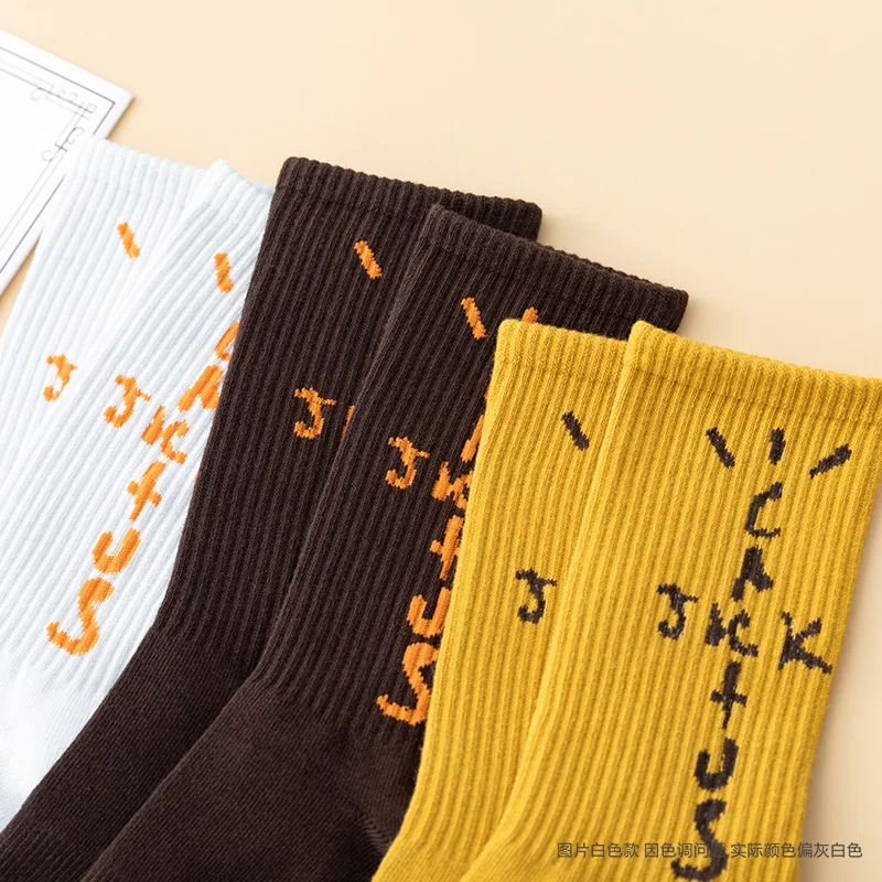 Couple color cotton socks New fashion for men and women Harajuku hip-hop skateboard Funny happy letter tube