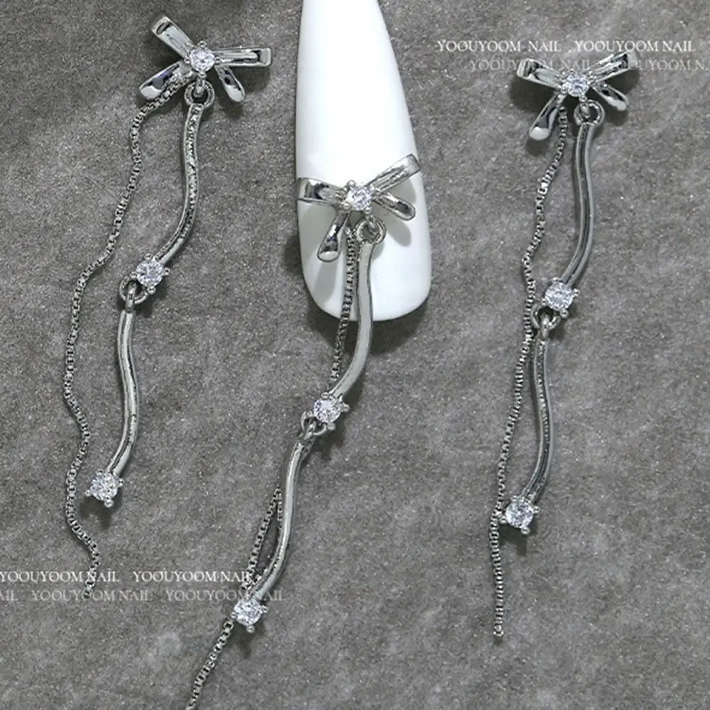 Accesorios para uñas, joyería de manicura 3D plateada, lazo, diamantes de imitación de cristal de Metal para uñas, decoración artística de uñas de mariposa a la moda para mujer