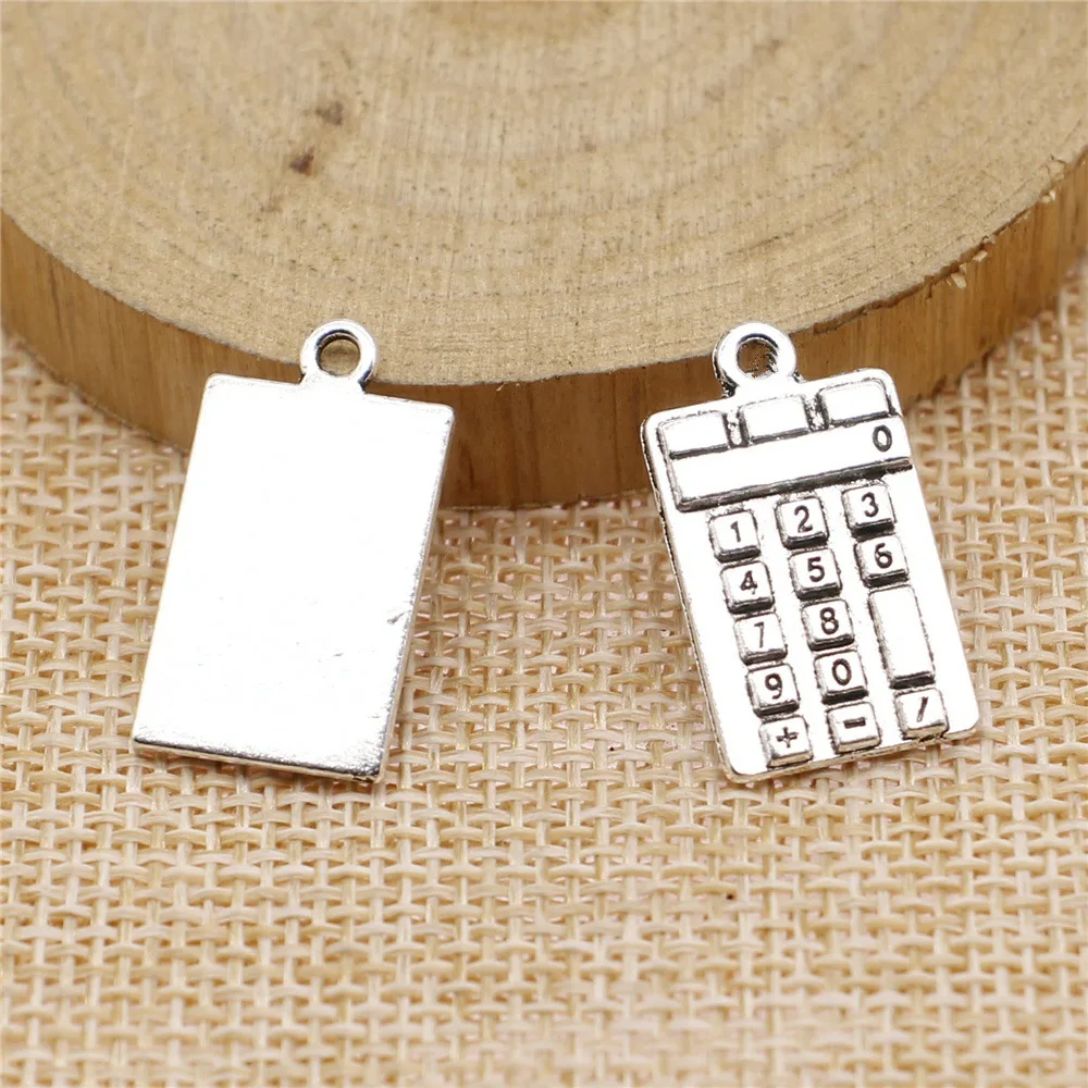 High Quality 10 Pieces/Lot 23mm*13mm Antique Silver Color Diy Metal Charms Calculator Charm For Diy Jewelry Making