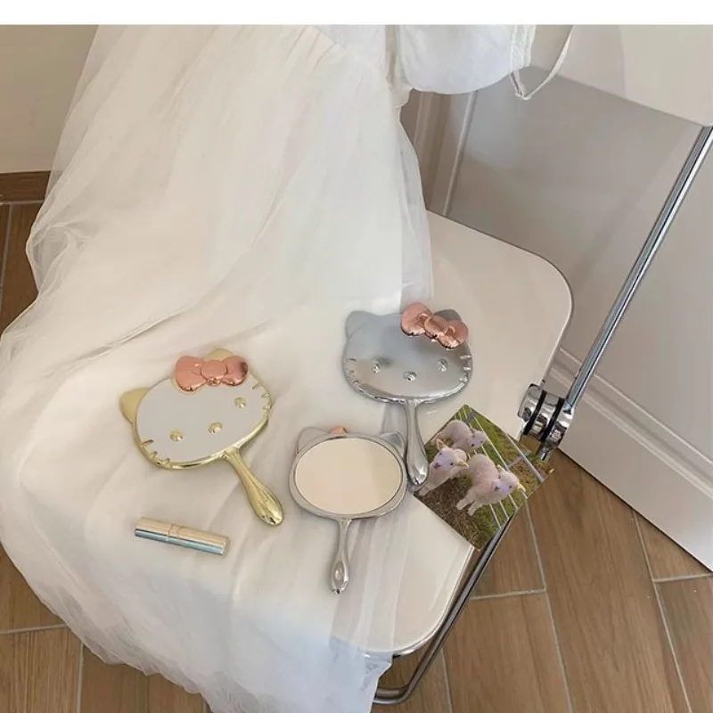 サンリオハローキティ猫ミニミラーアニメ漫画かわいいポータブルハンドル女の子折りたたみプリンセスミラー装飾子供の誕生日ギフト